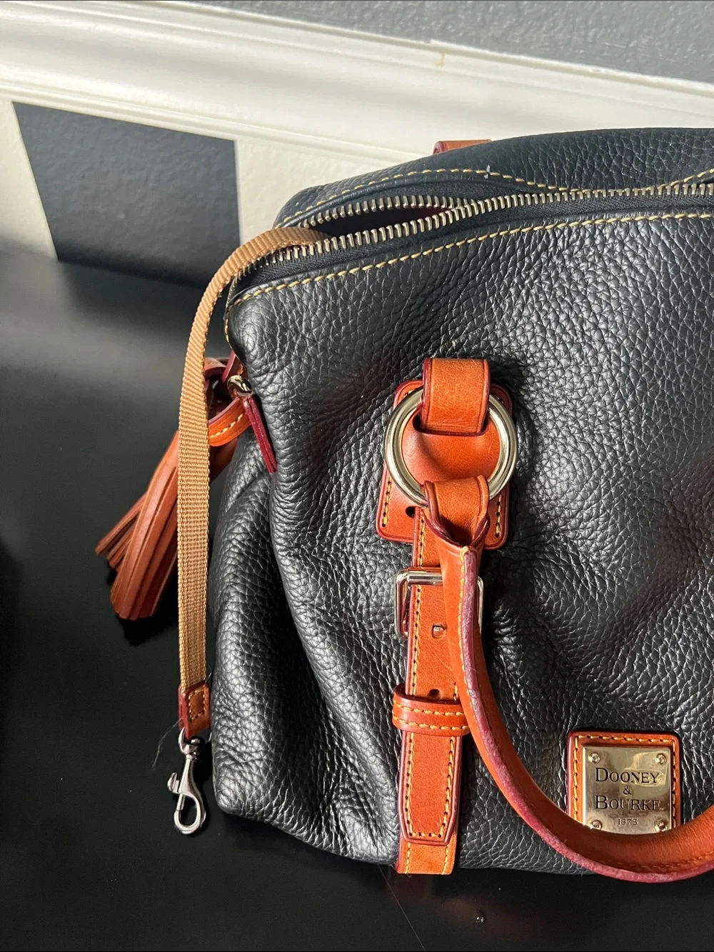 Dooney & Bourke Black Pebbled Leather Satchel with Brown Trim